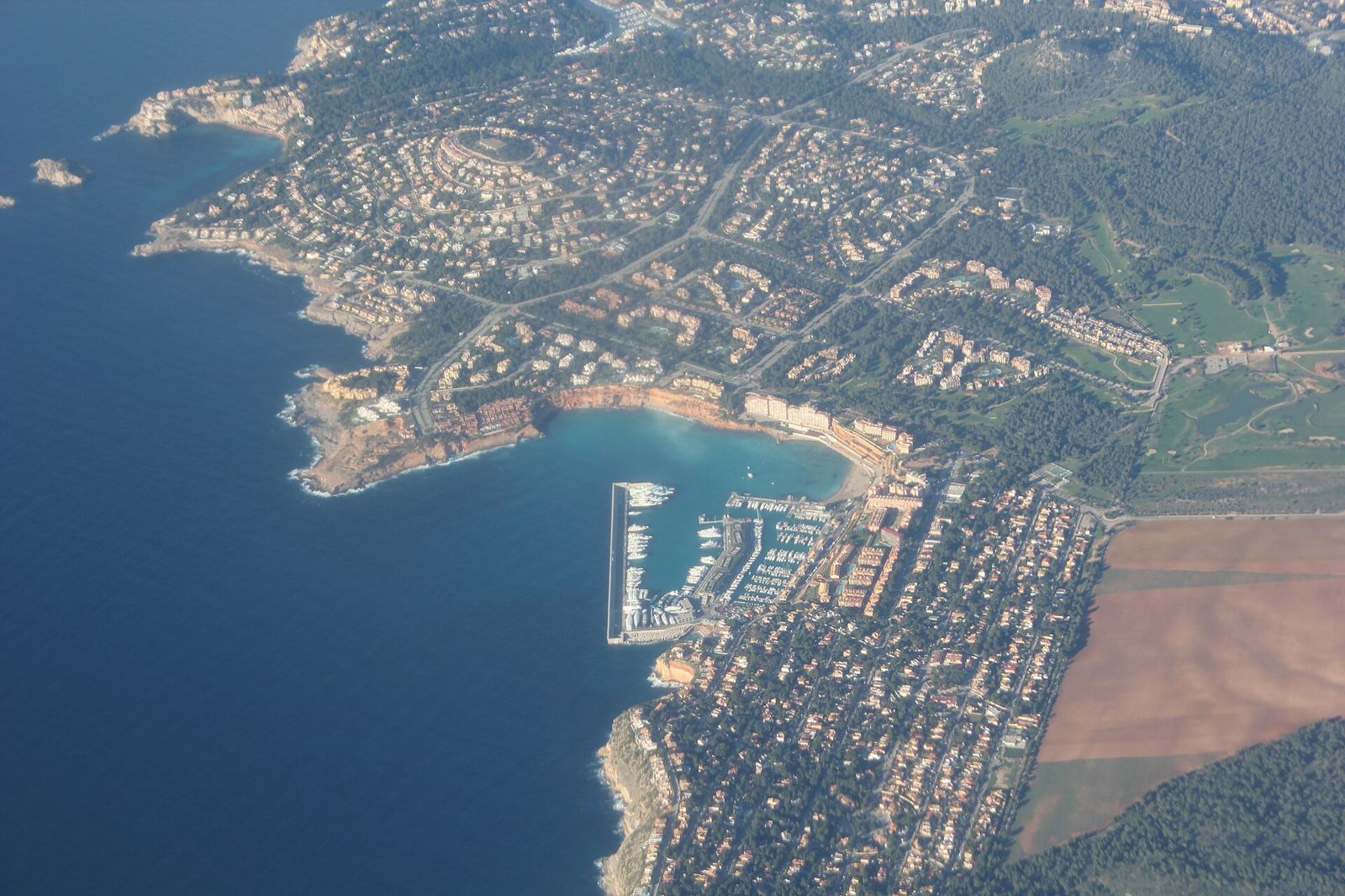 Aerial view of Port Adriano marina and El Toro, Mallorca — property management by SOLUXE